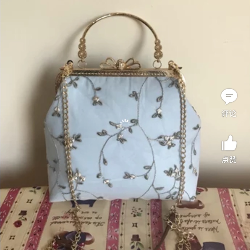 kiss lock lace bag